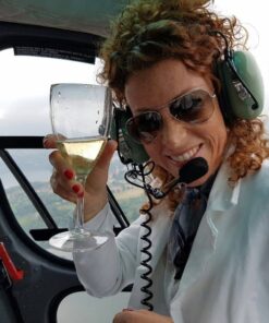 Breathtaking view of Lake Como and the surrounding mountains seen from a helicopter