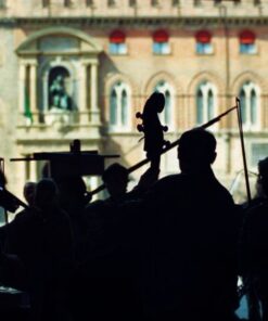 Street orchestra playing in Bologna, Italy, showcasing the city's UNESCO musical heritage