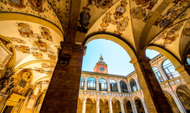 Palazzo dell'Archiginnasio, the ancient seat of the University of Bologna, with decorated porticoes.