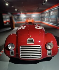 Ferrari Museum, Maranello: Display of iconic red cars.